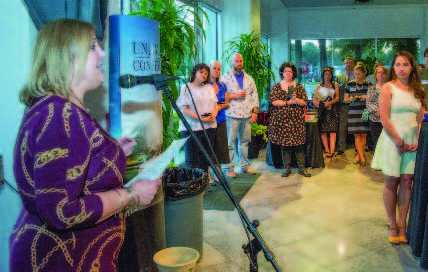 ASGO President Donna Lorman addresses attendees at ASGO's anniversary party.